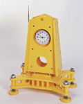 Large yellow clock with moon landing feet