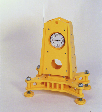 Large yellow clock with moon landing feet